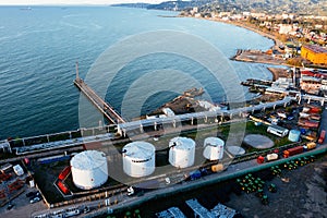 Oil or petroleum storage tanks in seaport, aerial drone view