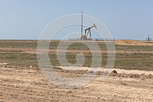 Oil platform, oil derricks in Kazakhstan steppes