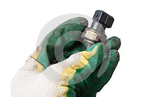 Oil pressure sensor of car isolated on white background in the arm in glove of mechanic. spare parts catalog