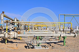 The oil production manifold at the wellsite