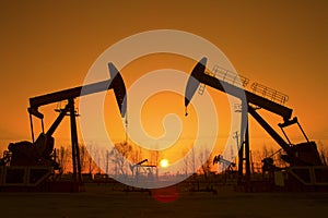 Oil pump against setting sun