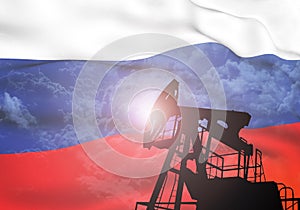 Oil pump on background of flag of Russia