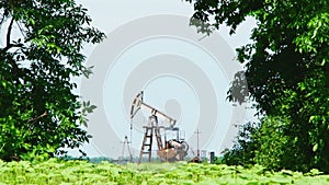 Oil Pump Drilling While Producing Natural Gas