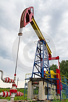 The oil pump on a sky background