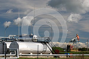 Oil pump and storage tanks