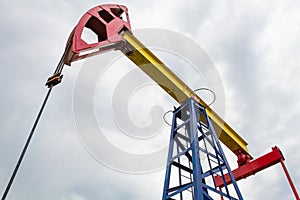 Oil pumpjack against the sky