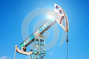 Oil pumpjack, industrial equipment. Rocking machines for power generation. Extraction of oil. Oil well industry