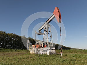 Oil pumpjack. Oil industry equipment