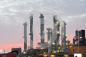 Oil refinery at dramatic sunrise