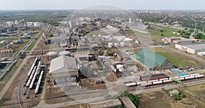 Oil refinery, drone shot. Reservoirs, tanks, chimneys, pipes