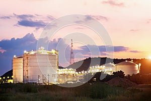 Oil Refinery factory at twilight , petrochemical plant , Petroleum