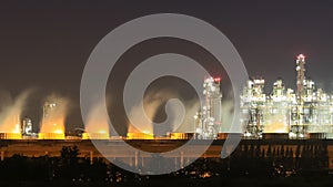 Oil refinery industrial plant with sky at night, Thailand