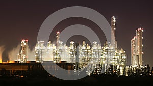 Oil refinery industrial plant with sky at night, Thailand