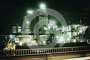 Oil refinery in Mannheim, Germany, europe petrochemical industry night scene scrap metal vintage