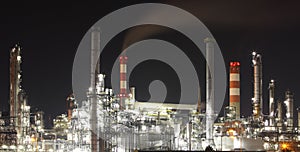 Oil refinery at night - factory - petrochemical plant