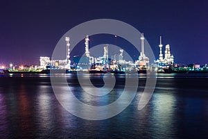 Oil refinery at night scene