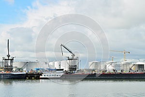 Oil refinery and oil tanker in the harbor of rotte