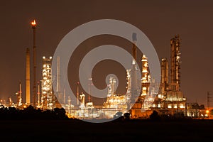 Oil refinery, petrochemical plant at industial estate night time photo