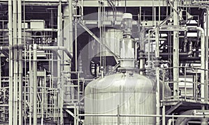 Oil refinery plant detail in vintage tone edit