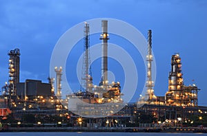 Oil refinery plant in heavy industry estate against beautiful du