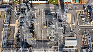 Oil refinery plant at industrial zone, Aerial view oil and gas business petrochemical industrial, Oil refinery factory white oil