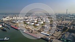 Oil refinery plant from industry zone, Aerial view oil and gas industrial, Refinery factory oil storage tank and pipeline steel