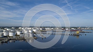 Oil refinery plant from industry zone, Aerial view oil and gas industrial, Refinery factory oil storage tank and pipeline steel