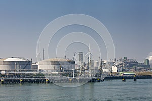 Oil refinery plant from industry zone, Aerial view oil and gas industrial, Refinery factory oil storage tank and pipeline steel