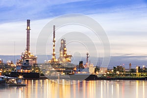 Oil refinery plant at twilight with copy space.