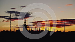 Oil refinery. Power and energy. Timelapse. Sunset time