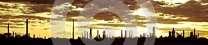 Oil refinery at sunset