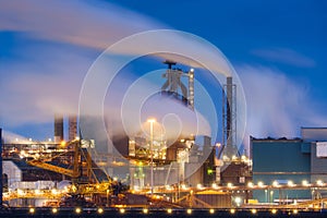 Oil refining. Heavy industry. View of production and factory. View of the factory at night. Emission of harmful substances