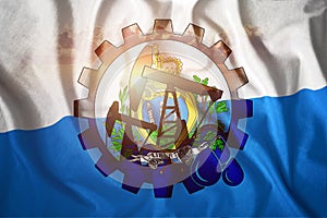 Oil rig on the background of the flag of Marino. Mixed environment. The concept of oil production, minerals, development of new