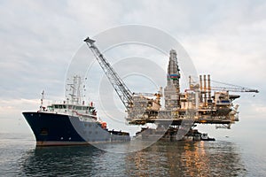 Oil rig being tugged