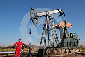 Oil Rig and Laborer