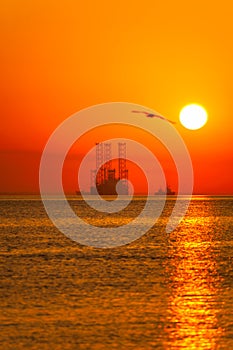 Oil rig at sunrising