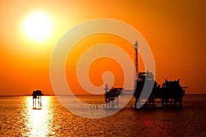 Oil rig in the sunset photo