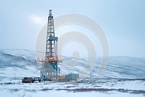 Oil rig in a winter field