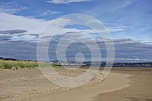 Oil Rigs in for a Refit at the Port of Dundee seen from Tentsmuir Point on the south side of the Tay estuary. photo