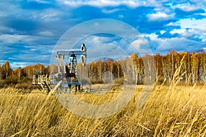 Oil rocking in the field in the fall. Russia. republic of bashkortostan. Rosneft, Bashneft