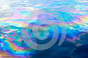 Oil slick creates Rainbow Colors on Water