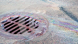 The oil slick is flushed down the rain drain