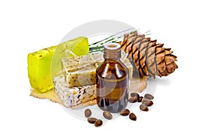 Oil and soap different with cedar nuts and cone