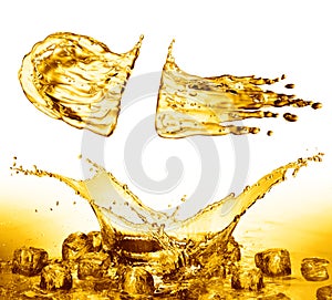 Oil splash on gold bokeh background