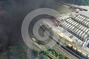 Oil storage fire. The tank farm is burning, black smoke is combu photo