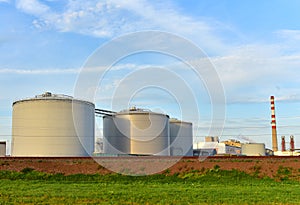 Oil storage tanks at Fuel terminal on plant.  Industrial facility for storage of oil and petrochemical products ready for