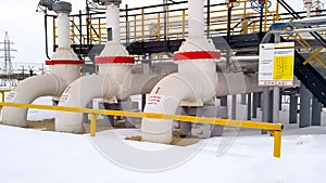 Oil supply pipeline to the oil preparation shop. Valves on the pipeline and service area