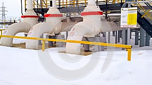 Oil supply pipeline to the oil preparation shop. Valves on the pipeline and service area