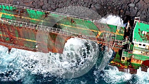 Oil tanker cargo ship ran aground the reunion island seen from a drone