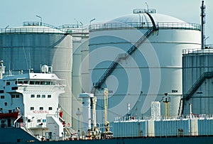 Oil tanker in front of oil station
